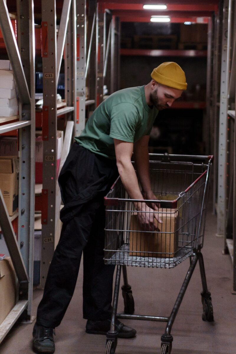 amazon warehouse worker fulfilling an order